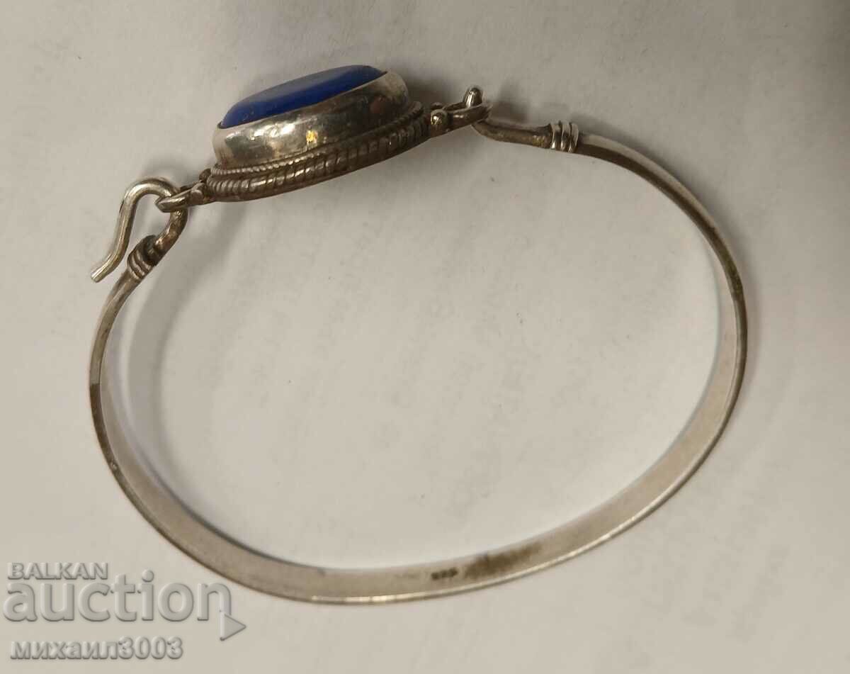 Silver bracelet with blue stone 925 sample 18.64 grams with price 99.00 BGN | € 50.62 Silver bracelet with blue stone 925 sample 18.64 grams with price 99.00 BGN | € 50.62