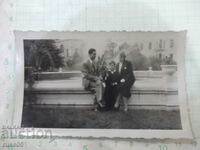 Old photo of a family in front of a fountain in America