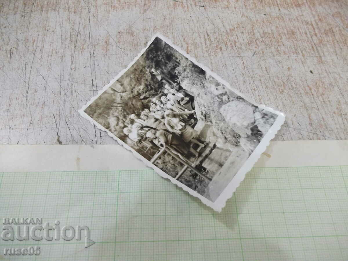 Auction An old photo of a group of elderly women on an outing by the rocks Auction An old photo of a group of elderly women on an outing by the rocks