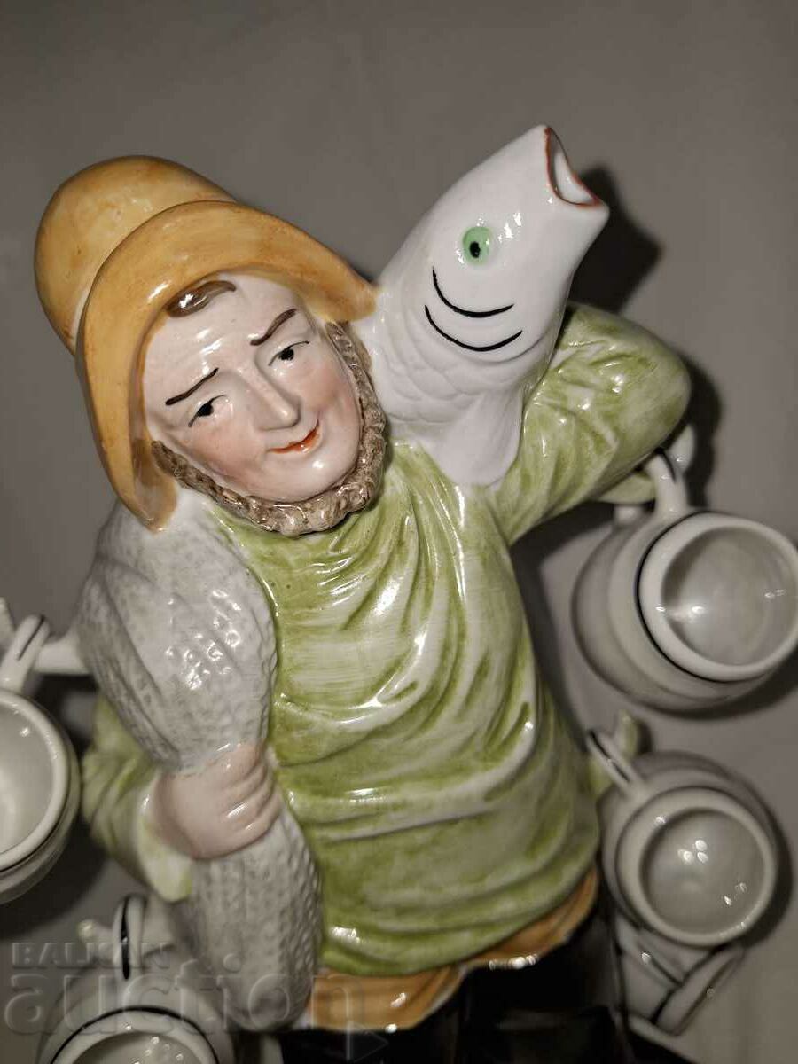 Auction Porcelain jug figure fisherman with cups Auction Porcelain jug figure fisherman with cups