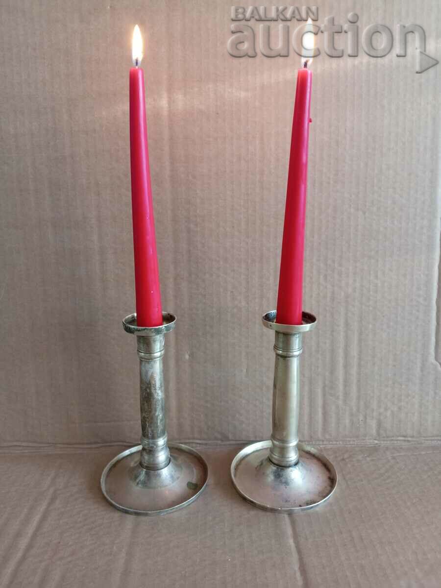 Delivery of a pair of antique renaissance bronze mantel candlesticks Delivery of a pair of antique renaissance bronze mantel candlesticks