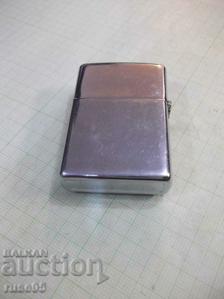 Auction Lighter "TOMMY HILFIGER" gasoline working Auction Lighter "TOMMY HILFIGER" gasoline working