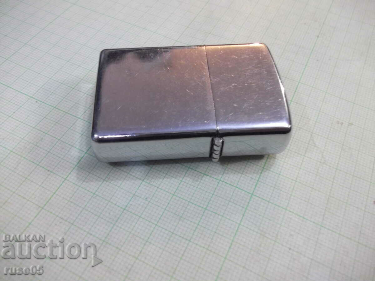 Delivery of Lighter "TOMMY HILFIGER" gasoline working Delivery of Lighter "TOMMY HILFIGER" gasoline working