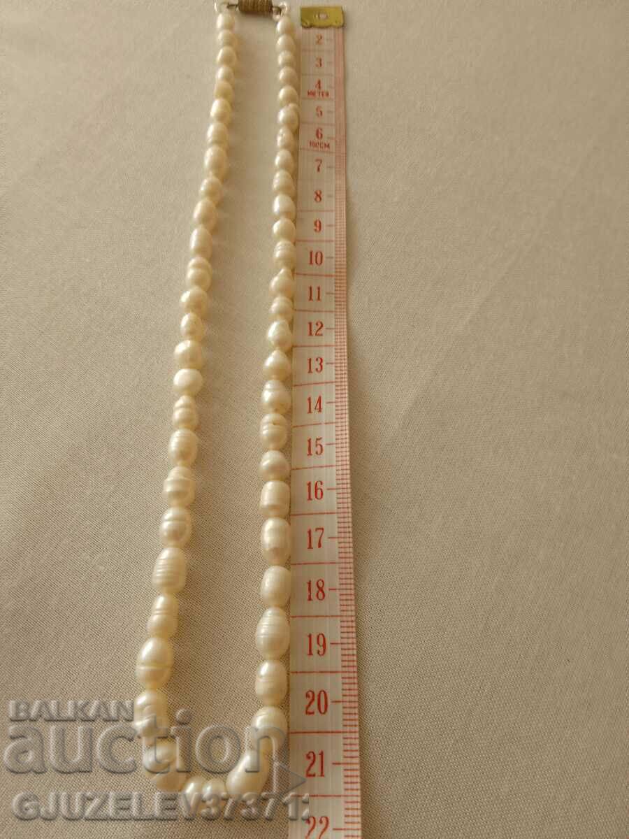 White natural freshwater pearl necklace with price 79.00 BGN | € 40.39 White natural freshwater pearl necklace with price 79.00 BGN | € 40.39