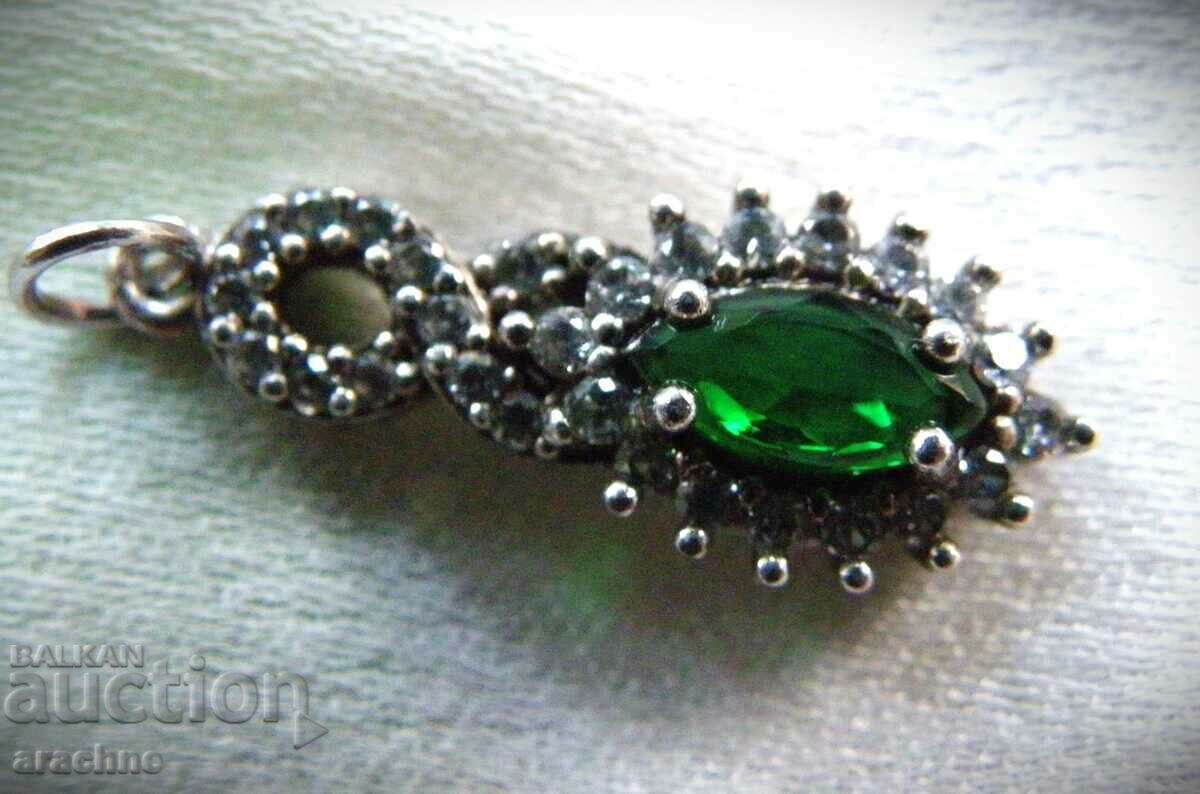 Silver medallion with verdelite and topaz with price 110.00 BGN | € 56.24 Silver medallion with verdelite and topaz with price 110.00 BGN | € 56.24