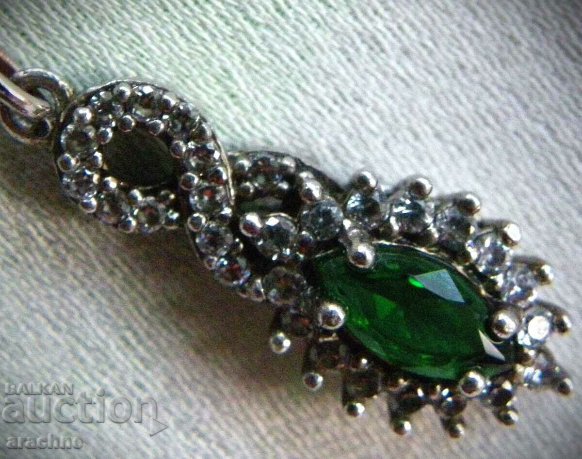 Delivery of Silver medallion with verdelite and topaz