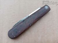 an antique blade knife from the last century