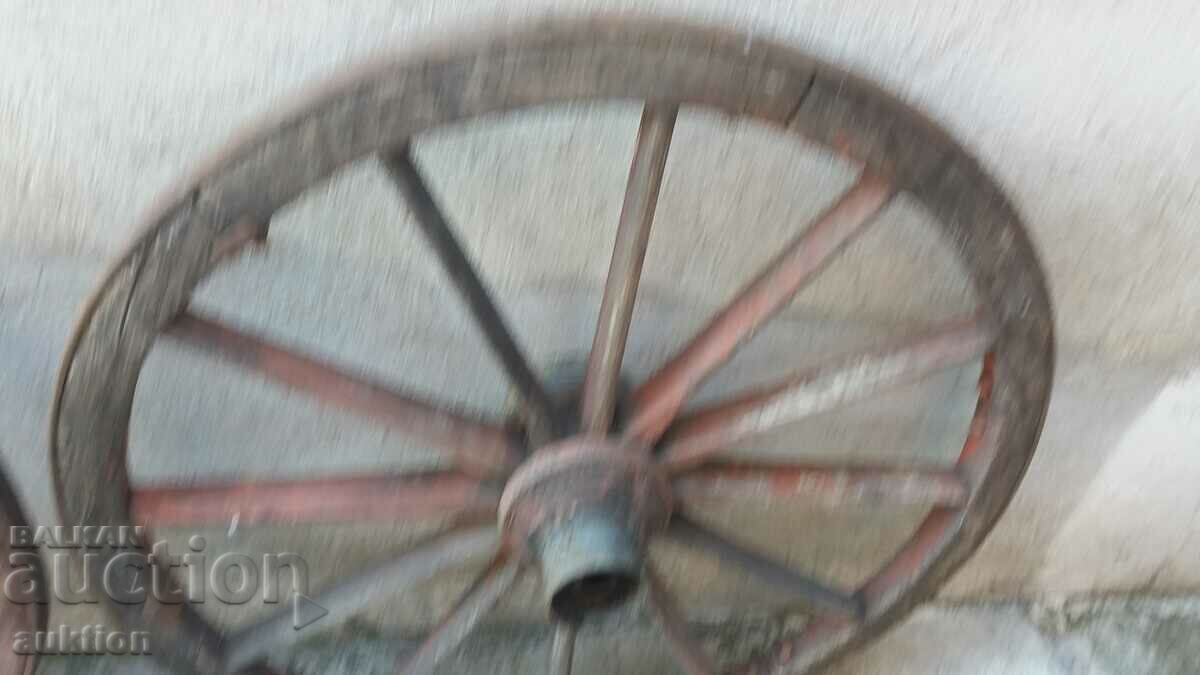 Auction SET OF TWO LARGE WAGON WHEELS Auction SET OF TWO LARGE WAGON WHEELS