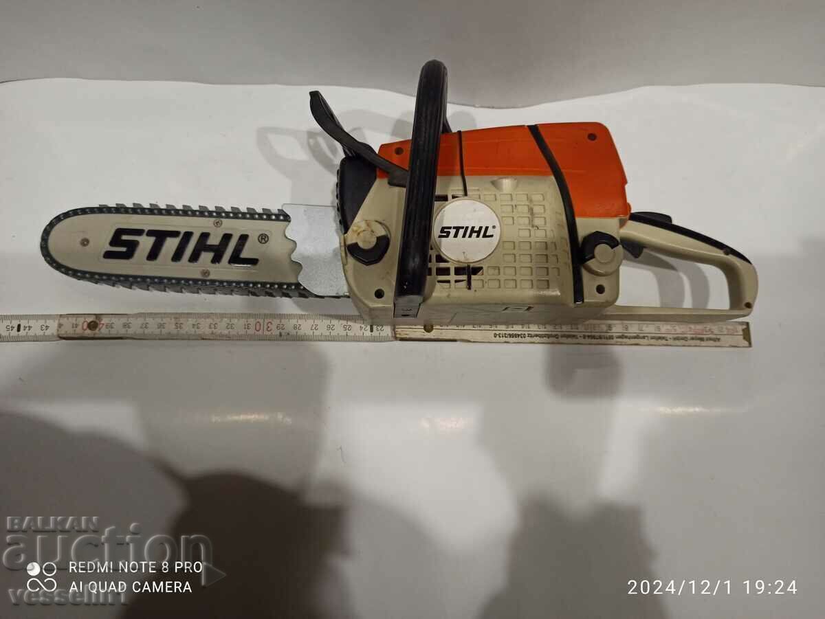 Old Stihl toy, small Stil chainsaw, children's chainsaw, advertisement Old Stihl toy, small Stil chainsaw, children's chainsaw, advertisement