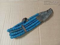 Vintage horse decoration with blue glass beads