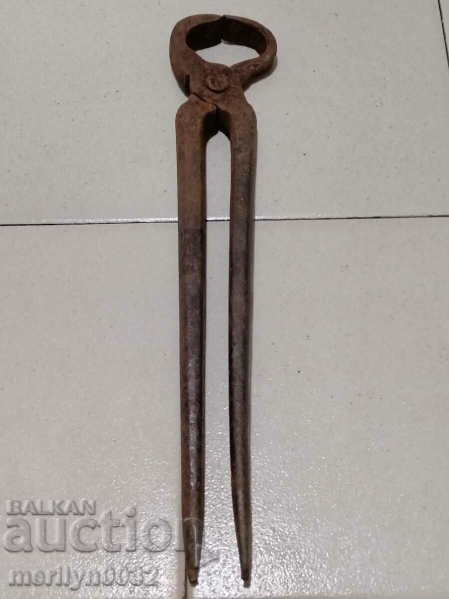 Auction Old blacksmith's tongs, wrought iron, tool Auction Old blacksmith's tongs, wrought iron, tool