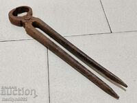 Old blacksmith's tongs, wrought iron, tool