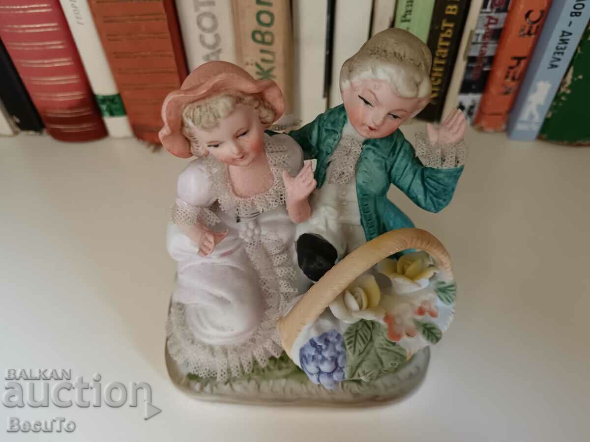Porcelain figurine girl and boy with basket, lace with price 25.00 BGN | € 12.78 Porcelain figurine girl and boy with basket, lace with price 25.00 BGN | € 12.78
