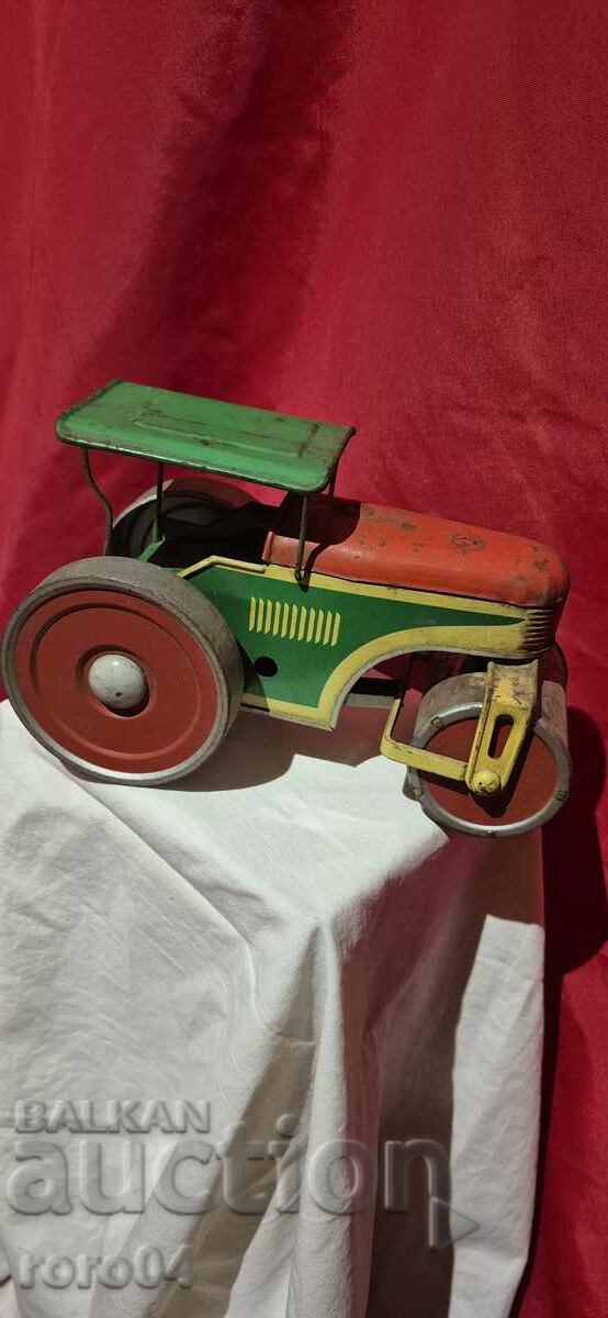 Auction  PIKO - TIN MECHANICAL PRESS - ROLLER