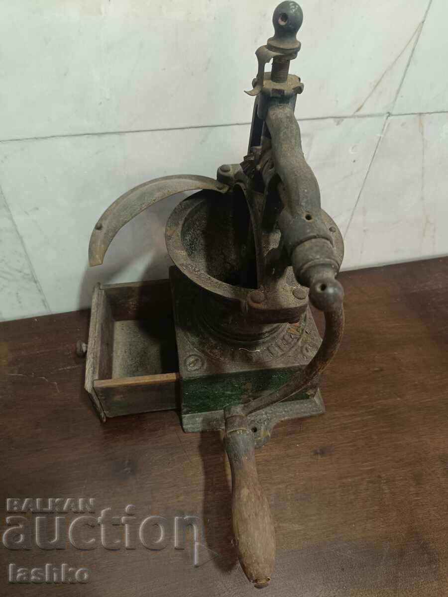 Delivery of Old coffee mill Delivery of Old coffee mill