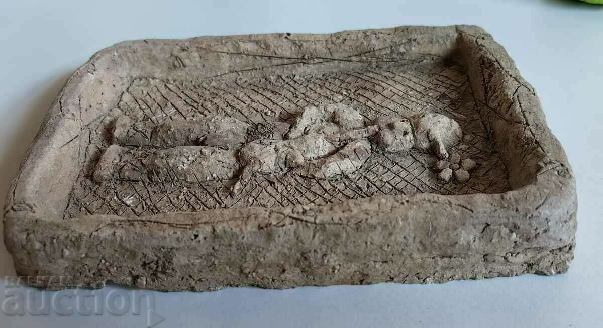 Delivery of . AN OLD CERAMIC PANEL OF A BASICIAN IN COSTUME Delivery of . AN OLD CERAMIC PANEL OF A BASICIAN IN COSTUME