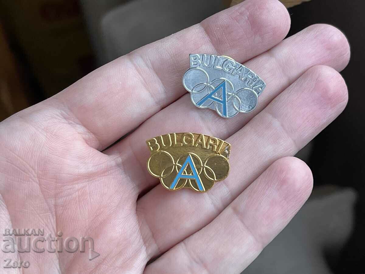 Auction Two collectible Olympic badges Auction Two collectible Olympic badges