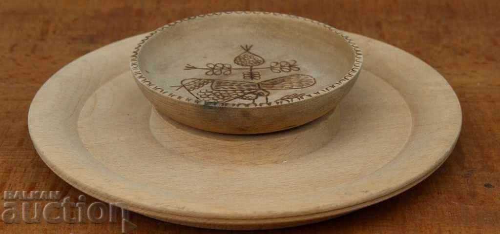 . PYROGRAPHED SALT SHANK WITH AN APPETIZER PLATE MEZE PLATE SPICES . PYROGRAPHED SALT SHANK WITH AN APPETIZER PLATE MEZE PLATE SPICES