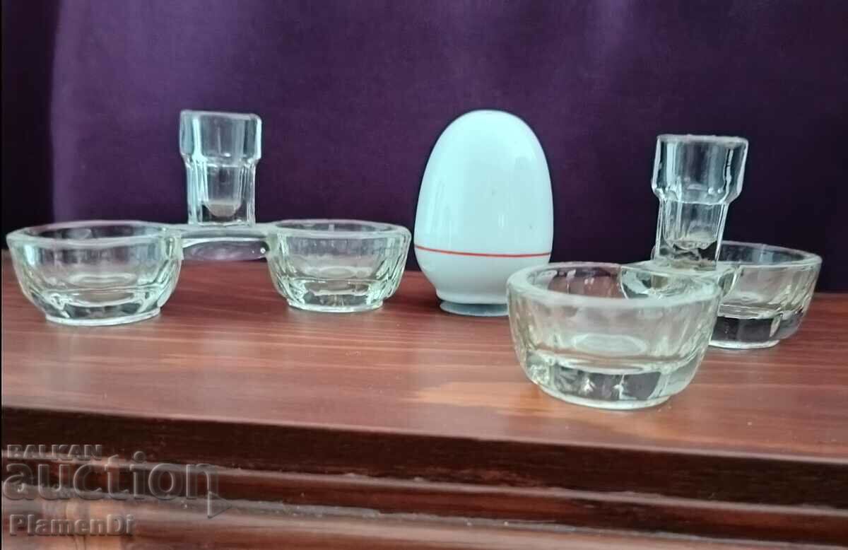 Old glass salt shakers, 2 pieces and 1 porcelain one.