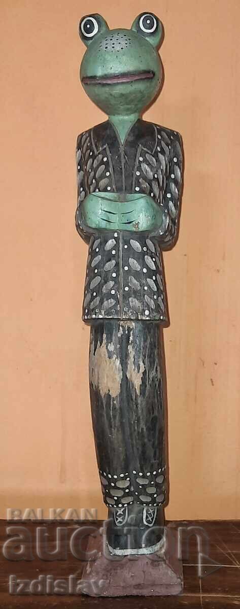 Wooden frog figurine. Wooden frog figurine.