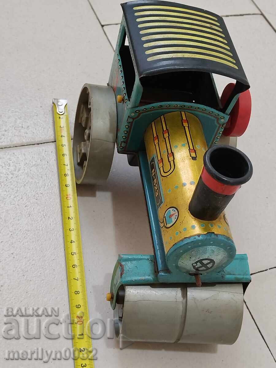 Доставка на Детска ламаринена играчка валяк Чехословакия 70-те години Доставка на Детска ламаринена играчка валяк Чехословакия 70-те години