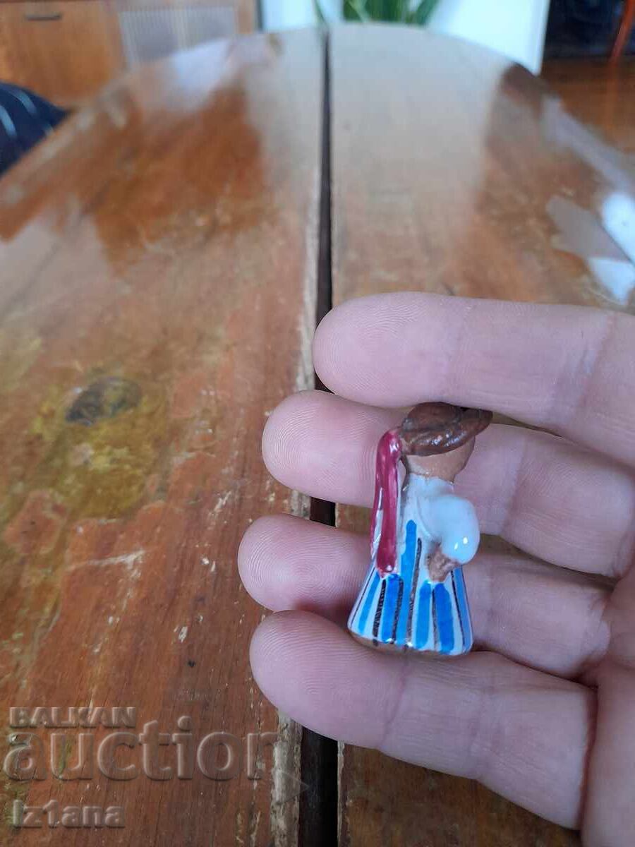 Auction  Old ceramic figurine