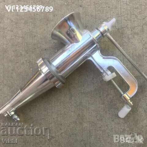 Manual meat grinder with metal tomato attachment