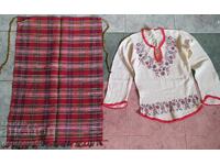 Old fringed shirt and woven apron