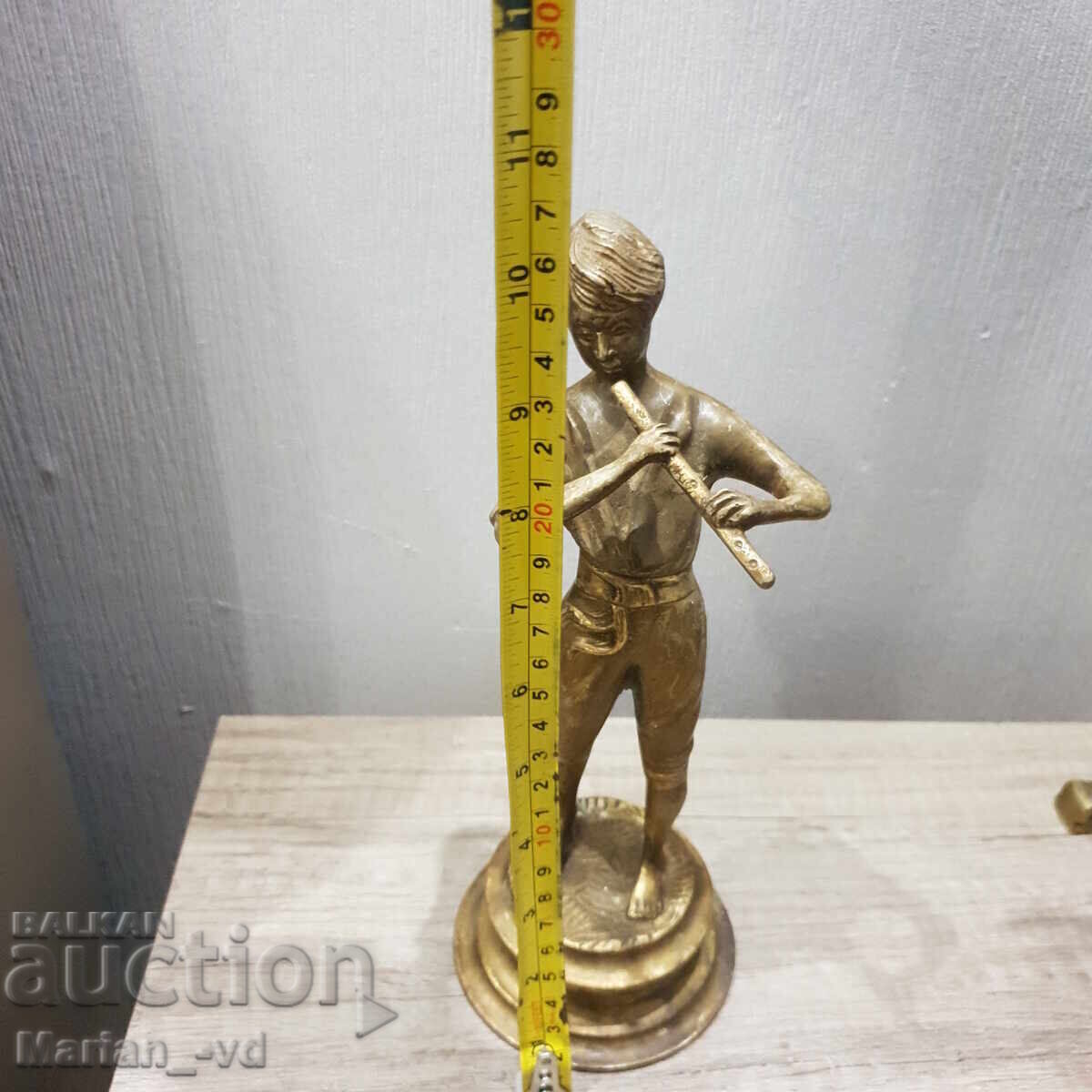 Old brass figure of a boy playing the flute with price 150.00 BGN | € 76.69 Old brass figure of a boy playing the flute with price 150.00 BGN | € 76.69
