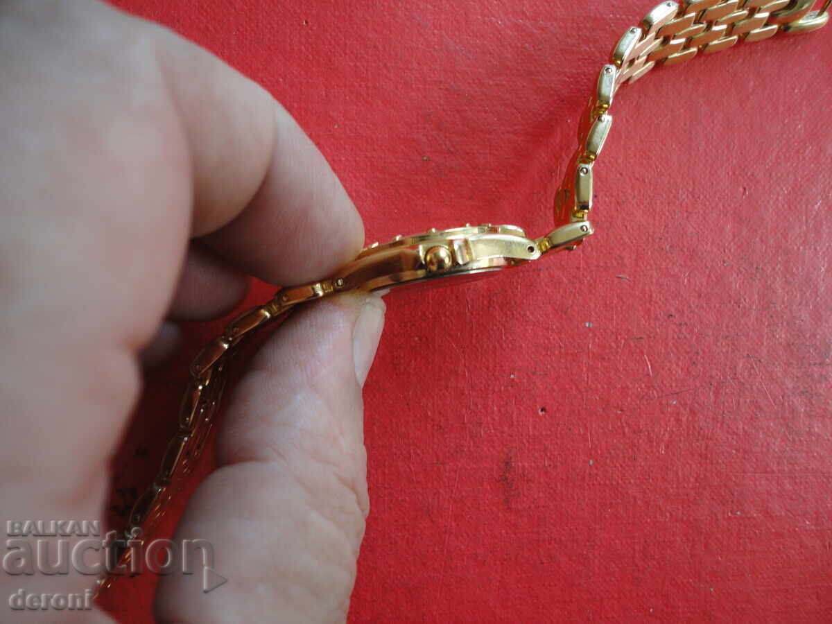 Delivery of Awesome gold-plated Geneves 6 watch