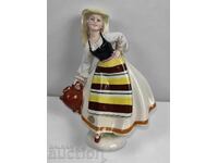 . PORCELAIN STATUETTE FIGURE WOMAN LADY WEARING STORM