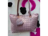 Women's leather bag with a pink puff