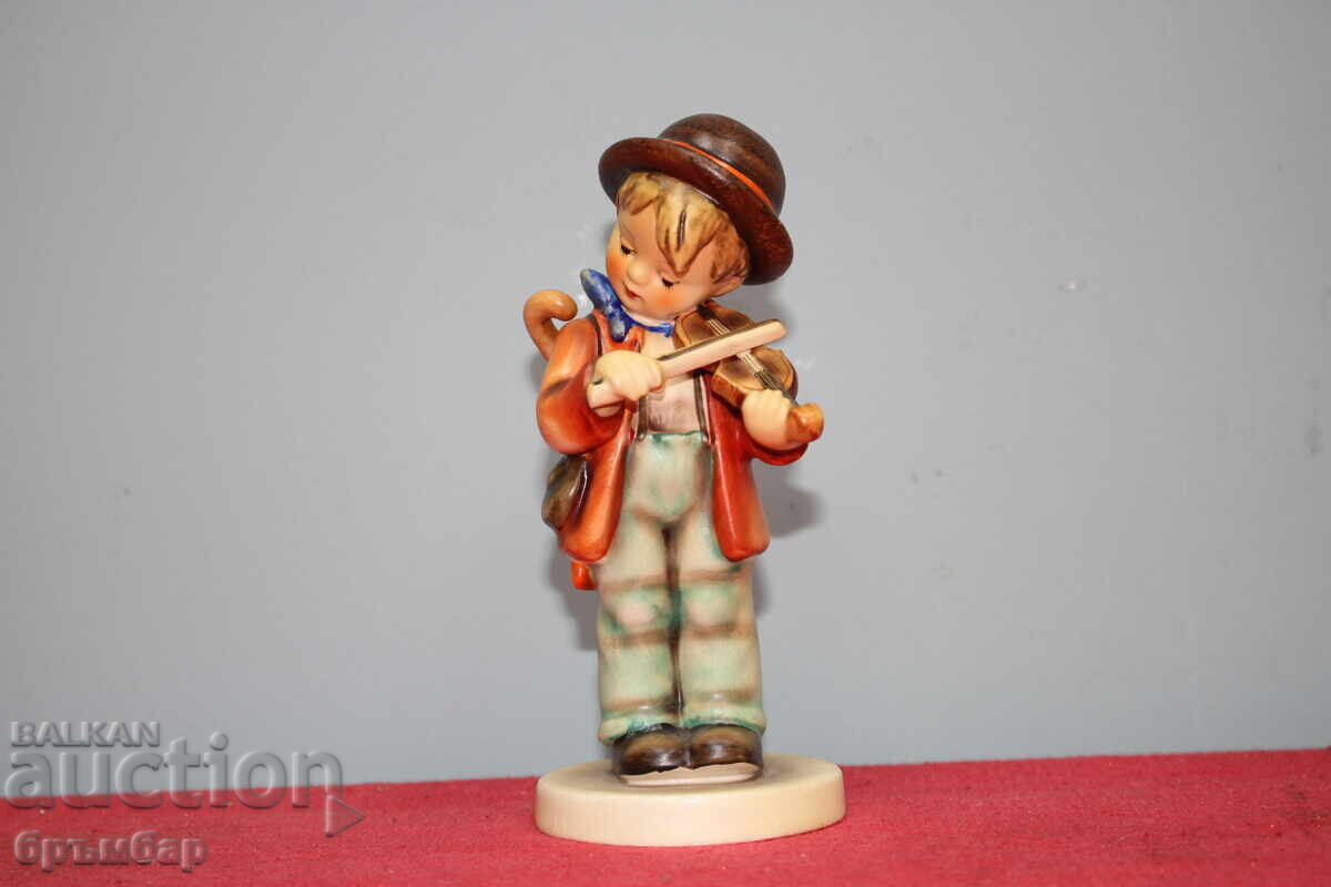 Hummel porcelain figurine boy with violin. Hummel porcelain figurine boy with violin.