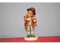 Hummel porcelain figurine boy with violin.