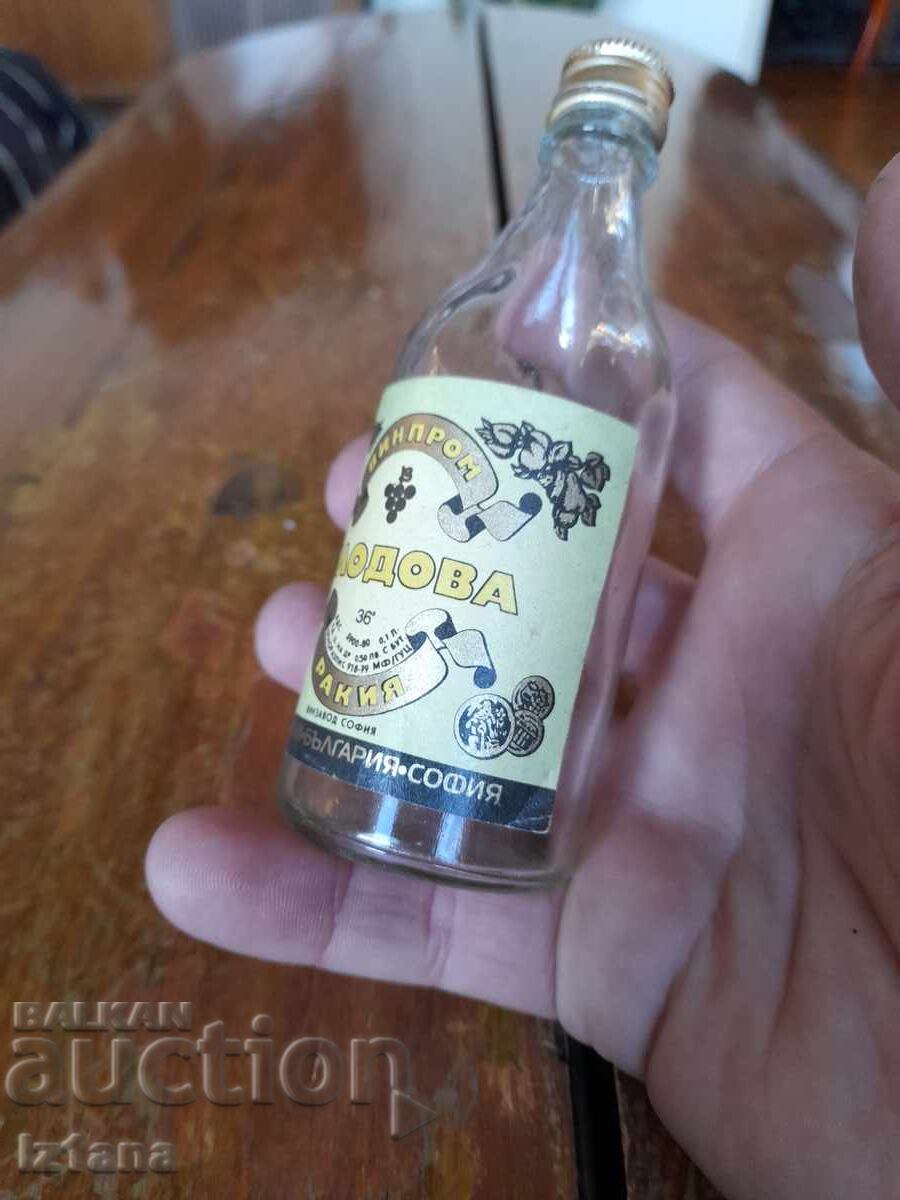 Auction  Old bottle of Fruit Brandy