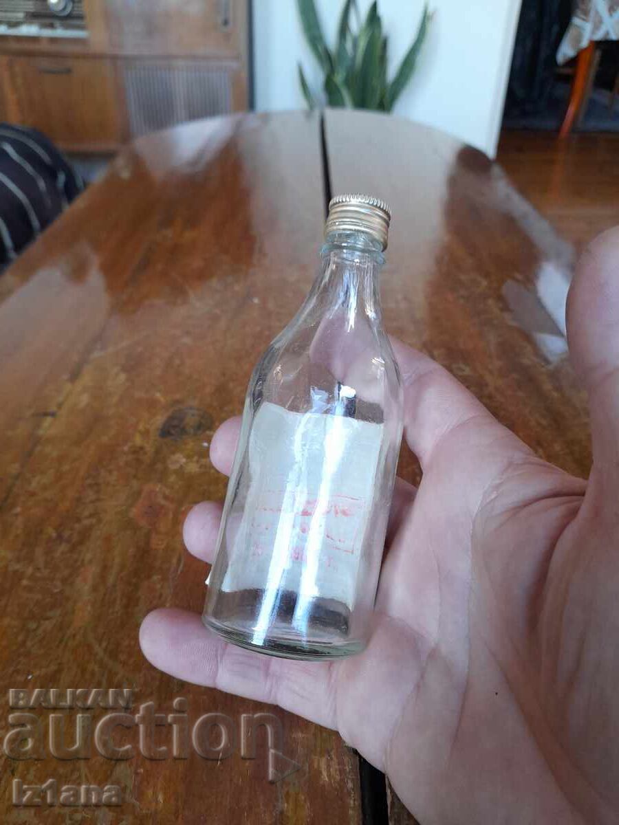 Delivery of Old bottle of Fruit Brandy