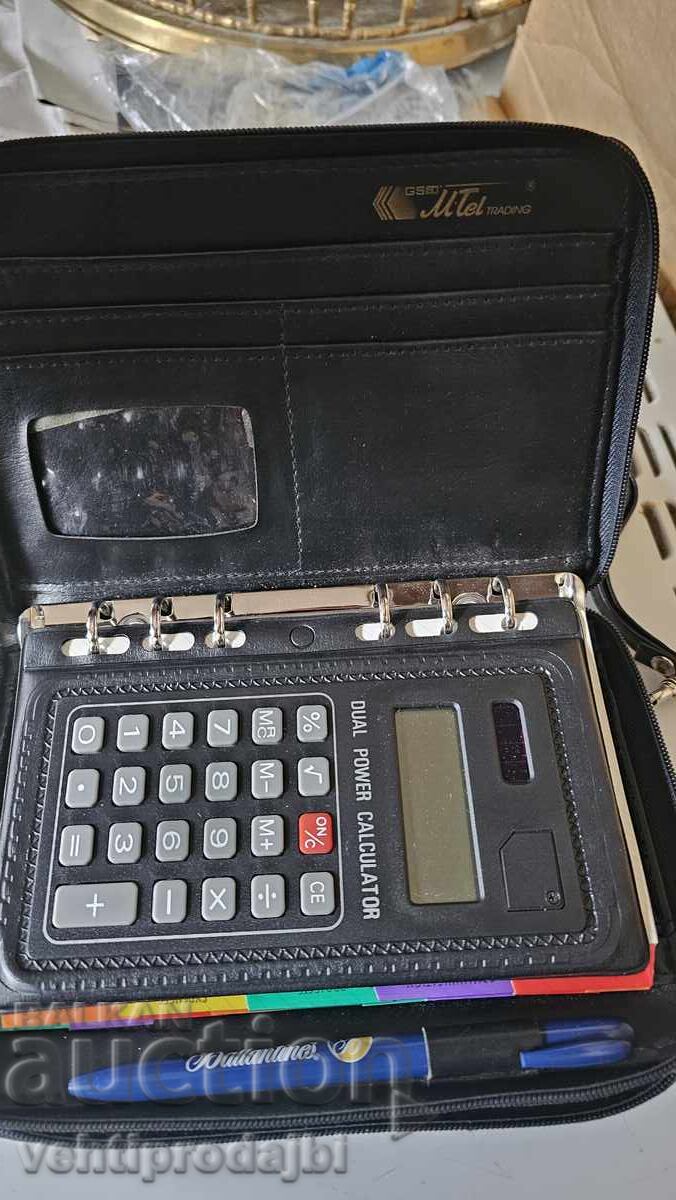 Toiletry bag with calculator, notebook and wallet with price 15.00 BGN | € 7.67 Toiletry bag with calculator, notebook and wallet with price 15.00 BGN | € 7.67