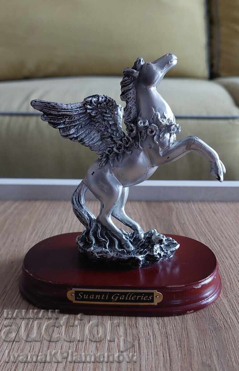 O figurină pentru cunoscători O figurină pentru cunoscători