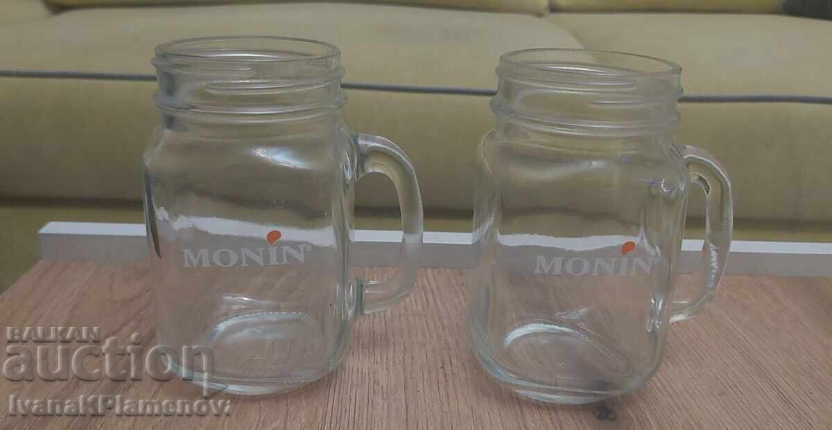 Auction Two glass jars Auction Two glass jars