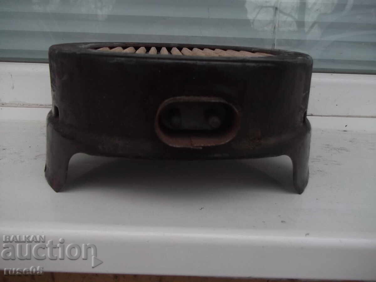 Auction Stove with exposed rheotan from soca working Auction Stove with exposed rheotan from soca working