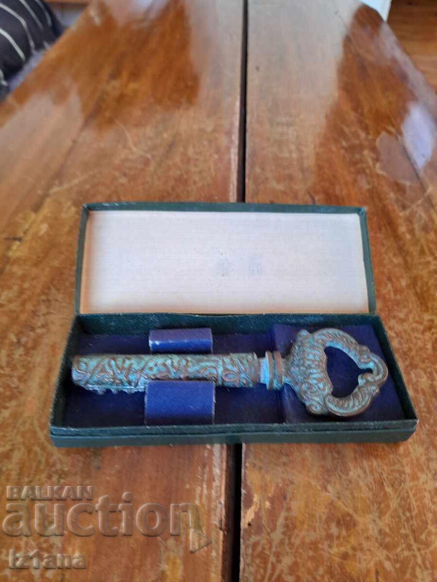 Auction Old souvenir corkscrew Auction Old souvenir corkscrew