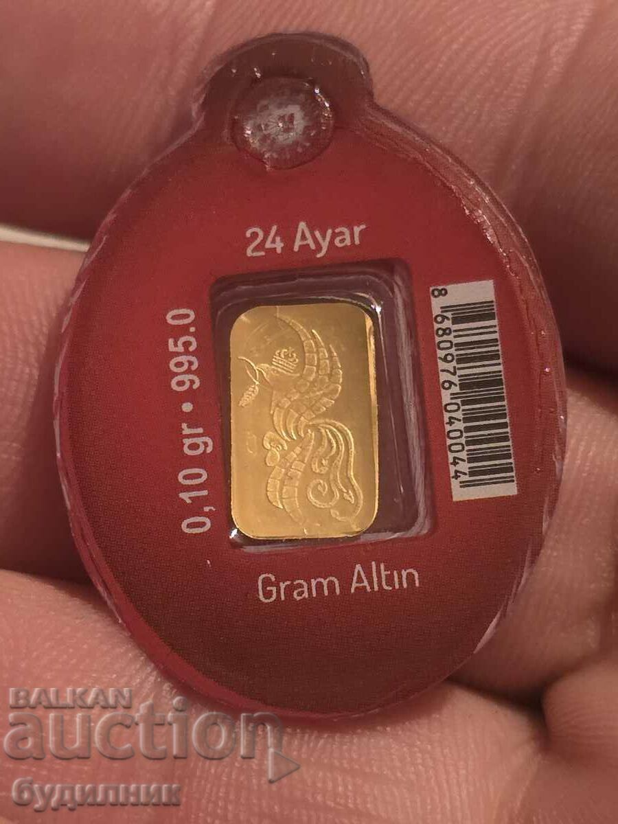 A gold bar. 0.10 grams. 24 Carat ..New.. Attention read