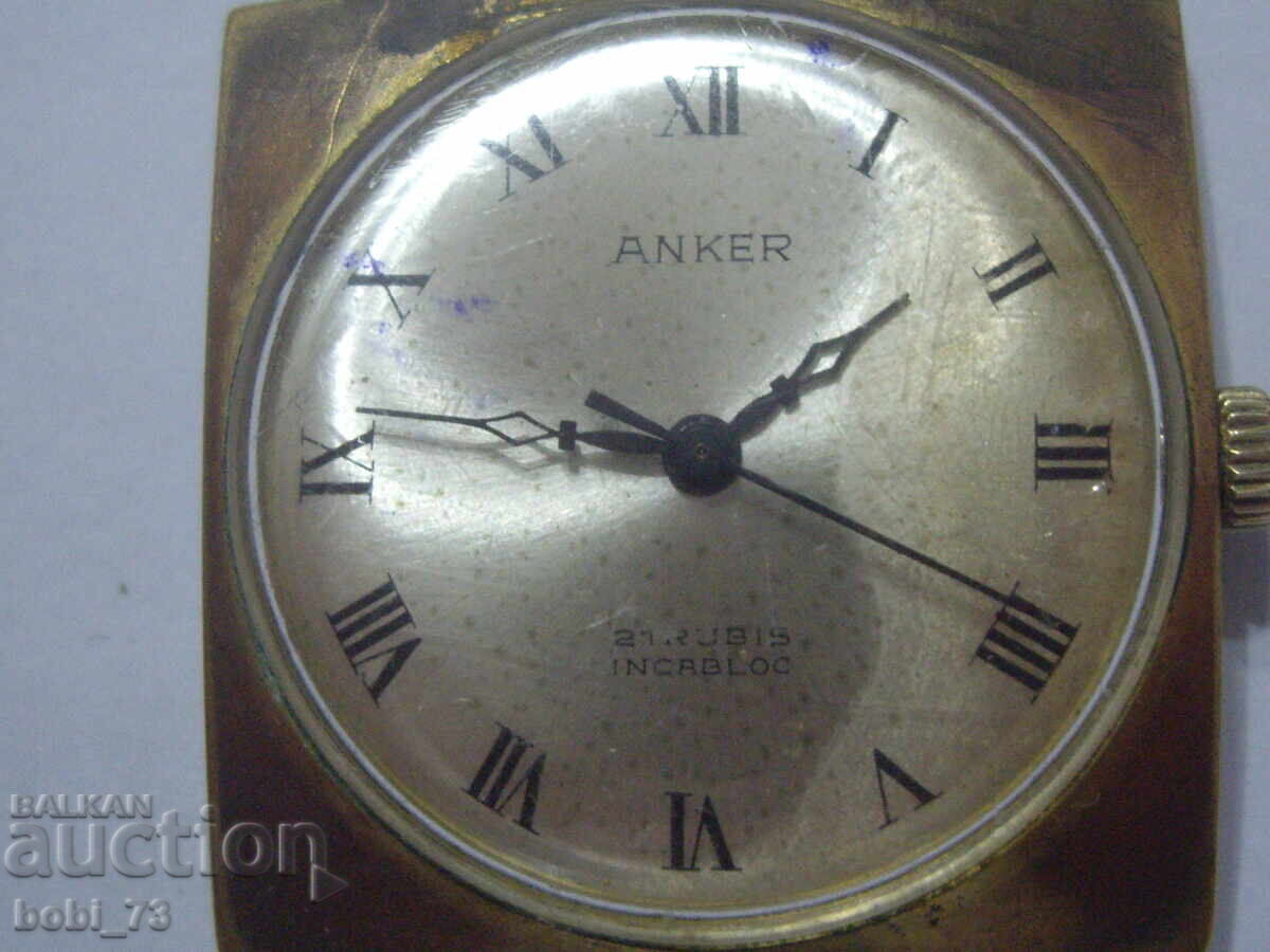 Auction  An old gilded watch.