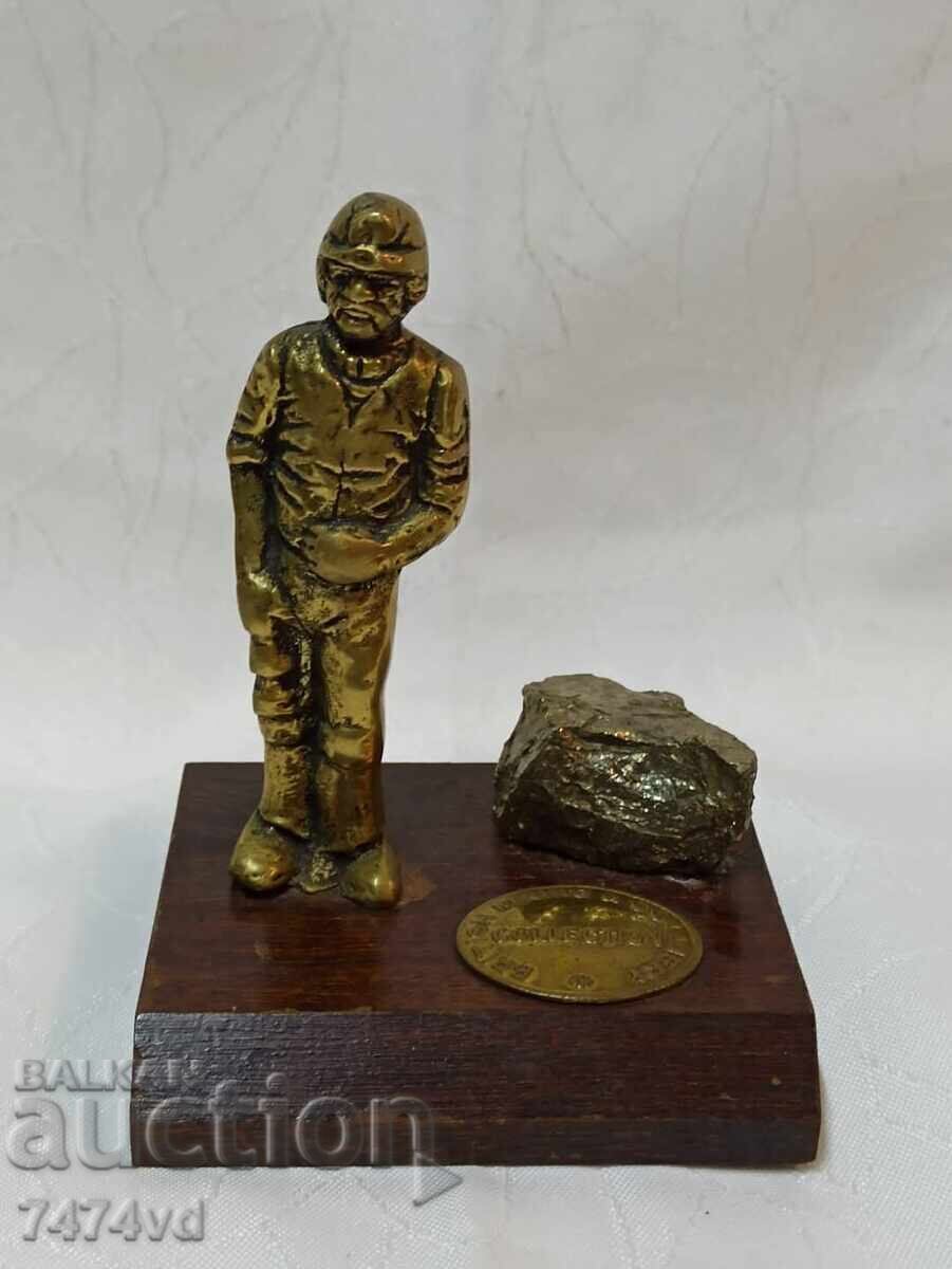 Bronze sculpture - Miner and pyrite stone. Bronze sculpture - Miner and pyrite stone.