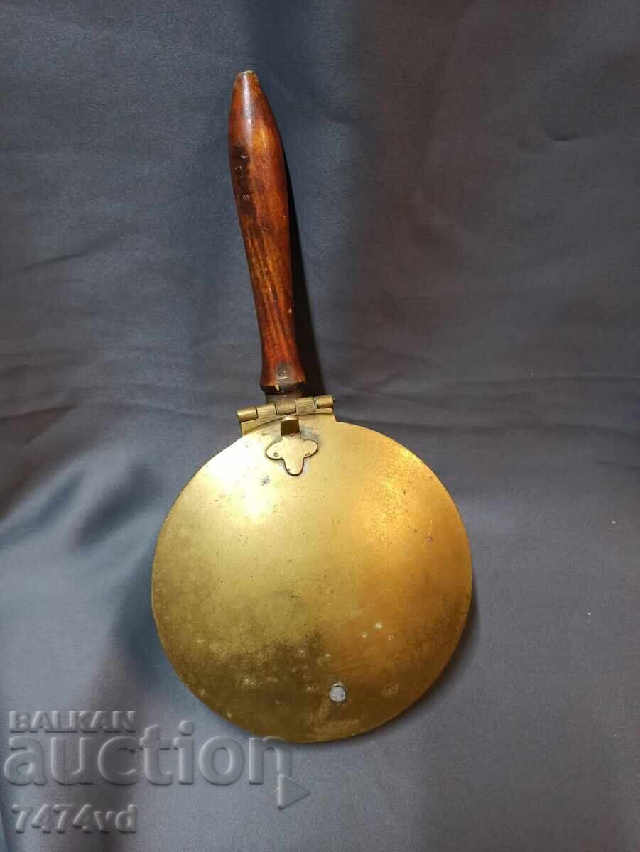 Old bronze vessel with lid and wooden handle Old bronze vessel with lid and wooden handle