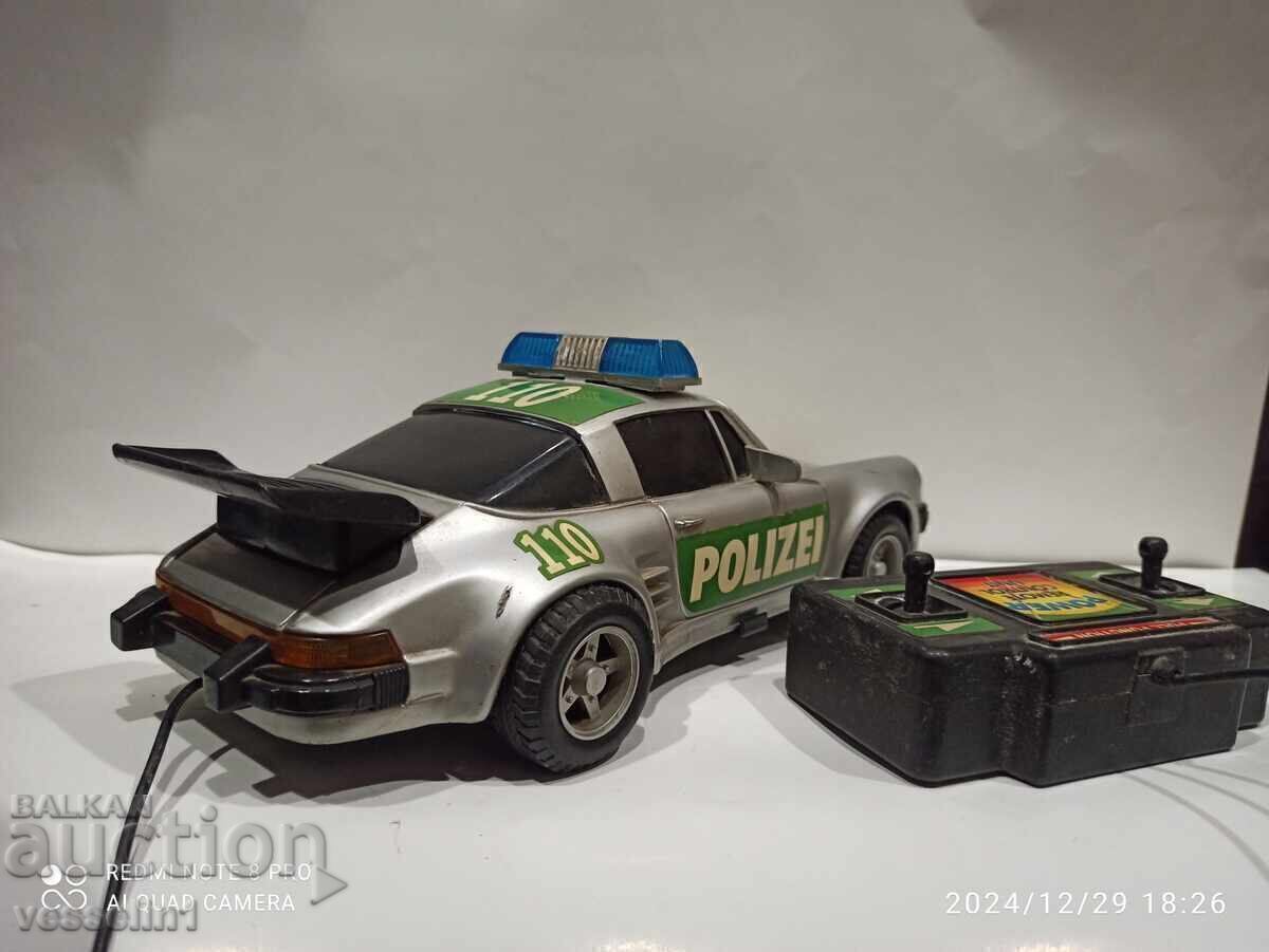 Licitație Porsche 911 de la începutul anilor 90, mașină veche mare cu telecomandă