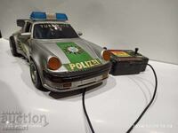 Old big car with remote control from the early 90s Porsche 911