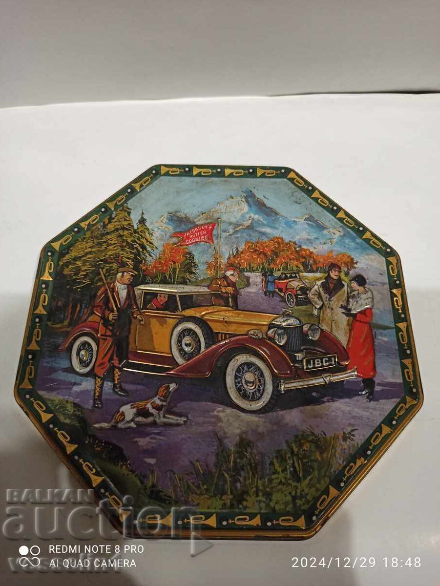 Old metal plate car made of sheet metal, embossed