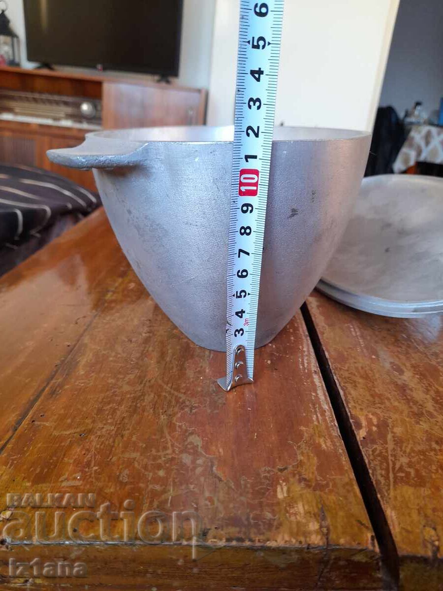 Auction  Old aluminum pot