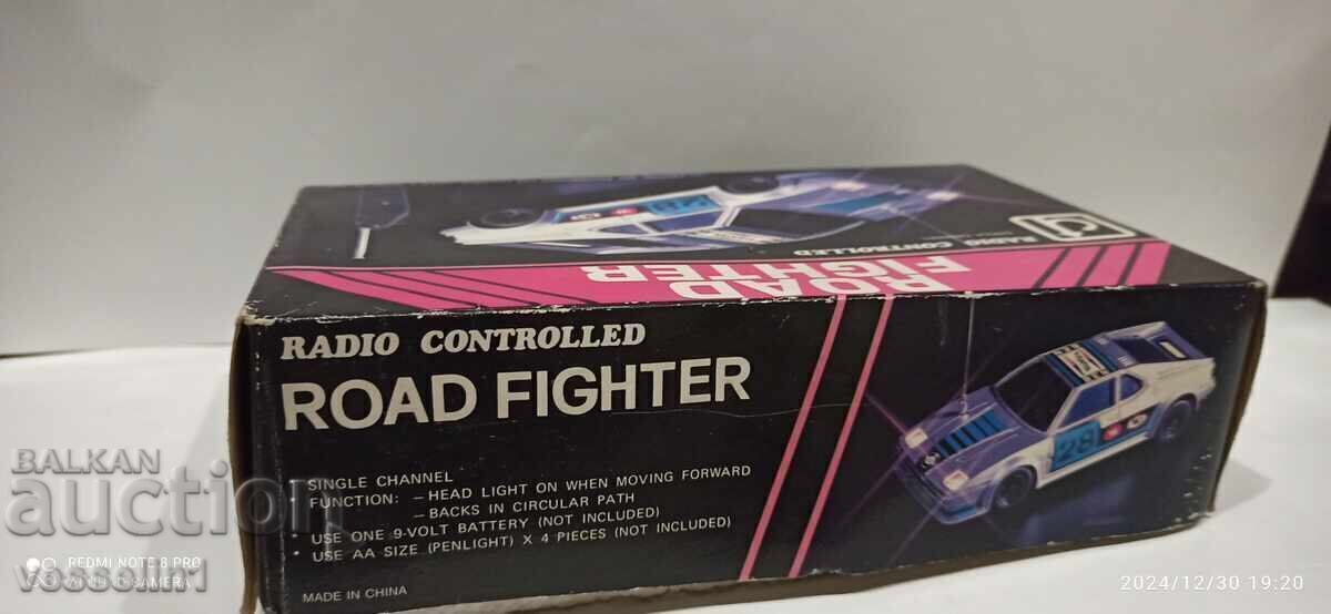 Cărucior vechi cu telecomandă BMW M1 într-o cutie mașină vintage BMW - 5